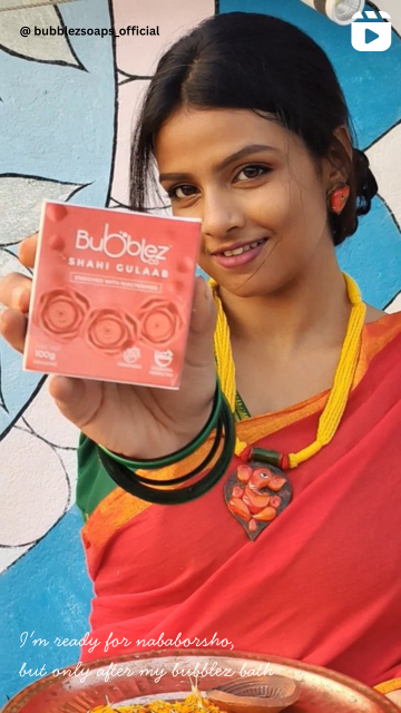 Woman holding Bubblez Shahi Gulaab Bathing Bar(Soap) 
